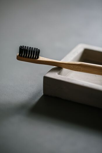 Grums toothbrush in olive bamboo