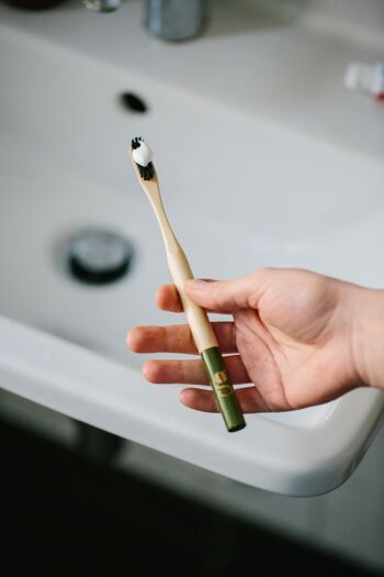 Grums toothbrush in olive bamboo