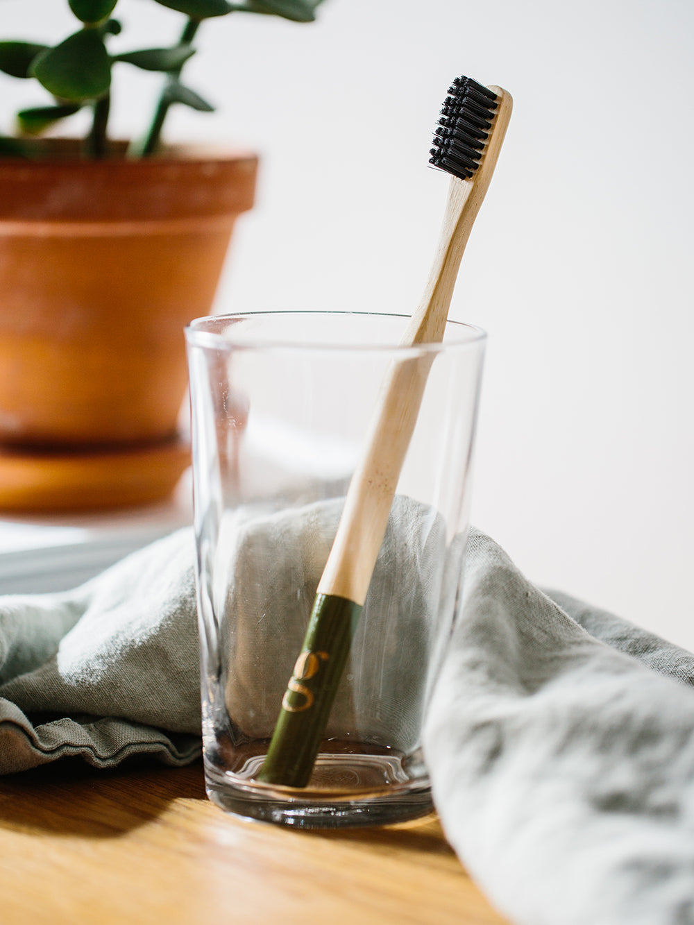 Grums toothbrush in olive bamboo